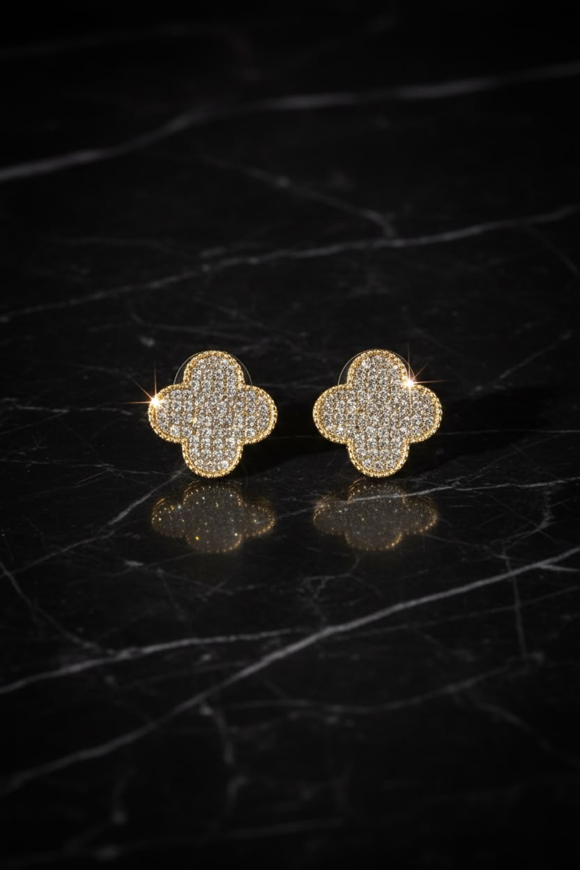 Iconic four leaf silver earring