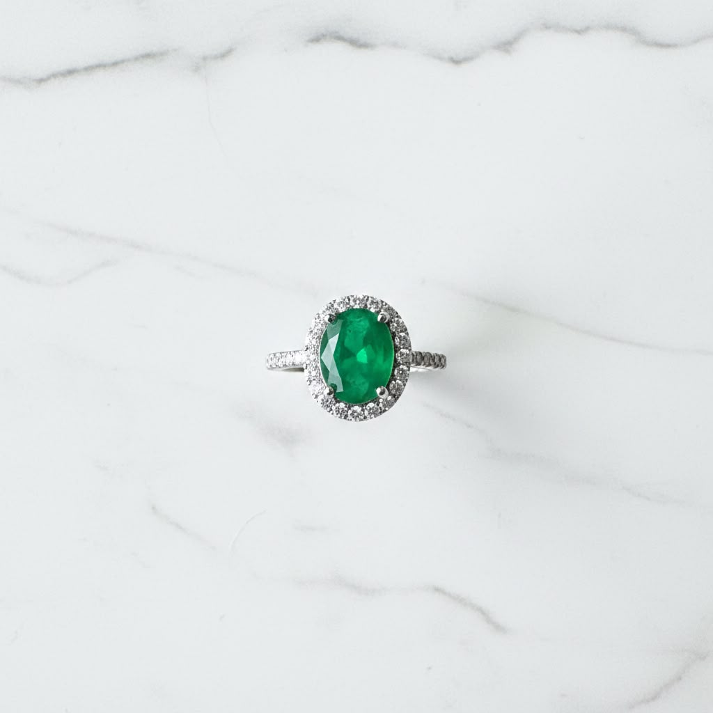 Oval green gemstone ring
