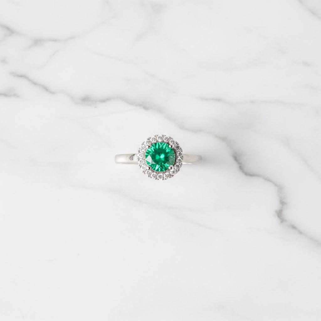 Oval green gemstone ring